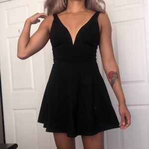Deep necked black cocktail dress - Lulu